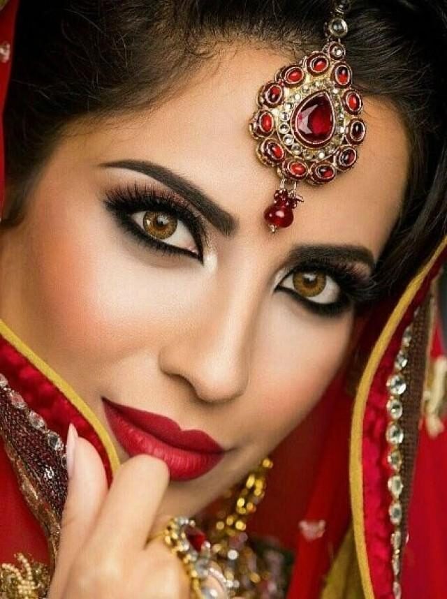 Asian bride with make up covering her chin
